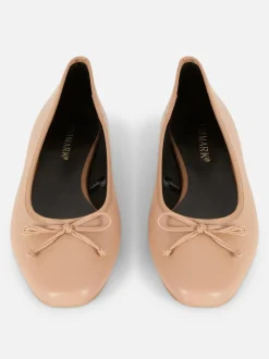 Baleriny na płaskiej podeszwie z kokardką