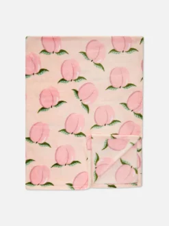 Bardzo miękka narzuta z nadrukiem w brzoskwinie