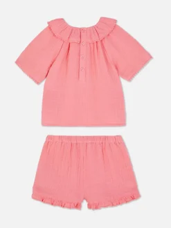 Bluzka z kołnierzykiem i szorty z falbankami