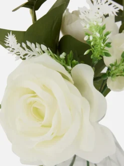 Bukiet kwiatów w szklanym wazonie