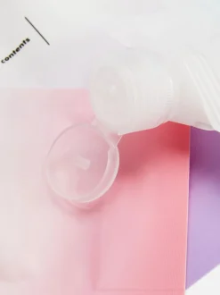 Butelki podróżne przypominające saszetki, 3 szt.