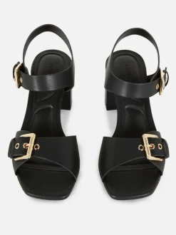 Buty na obcasie klockowym z ozdobnymi oczkami