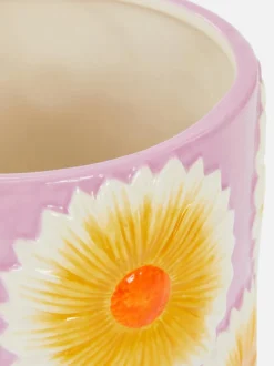 Ceramiczna doniczka z motywem kwiatowym
