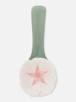 Ceramiczna podstawka pod łyżkę z motywem kwiatka