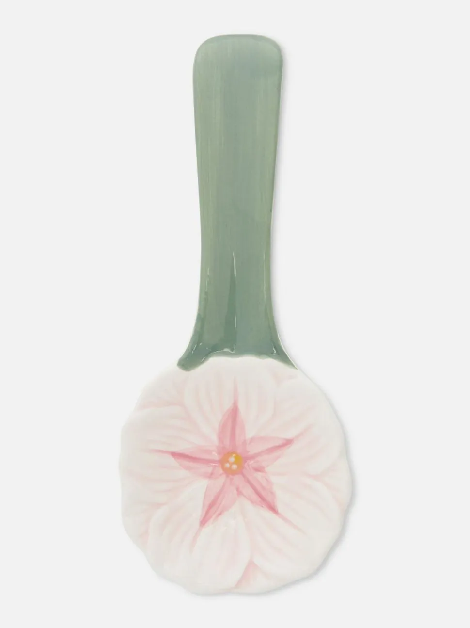 Ceramiczna podstawka pod łyżkę z motywem kwiatka