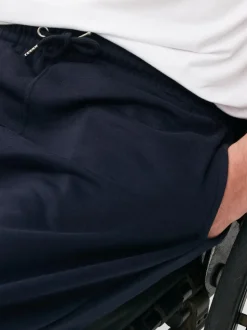 Ściągane sznurkiem spodnie dresowe ze zwężanymi nogawkami