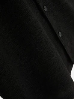 Dżersejowa koszula z zapięciem na guziki