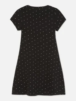 Dżersejowa sukienka w kropki z dekoltem w serek