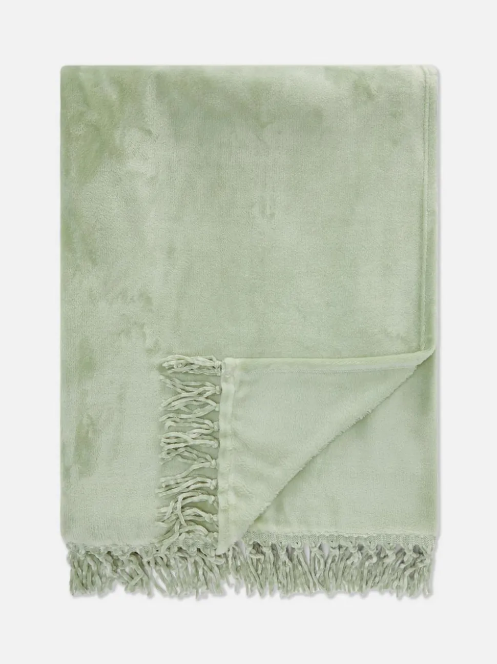 Duża miękka narzuta z frędzlami przy obszyciu