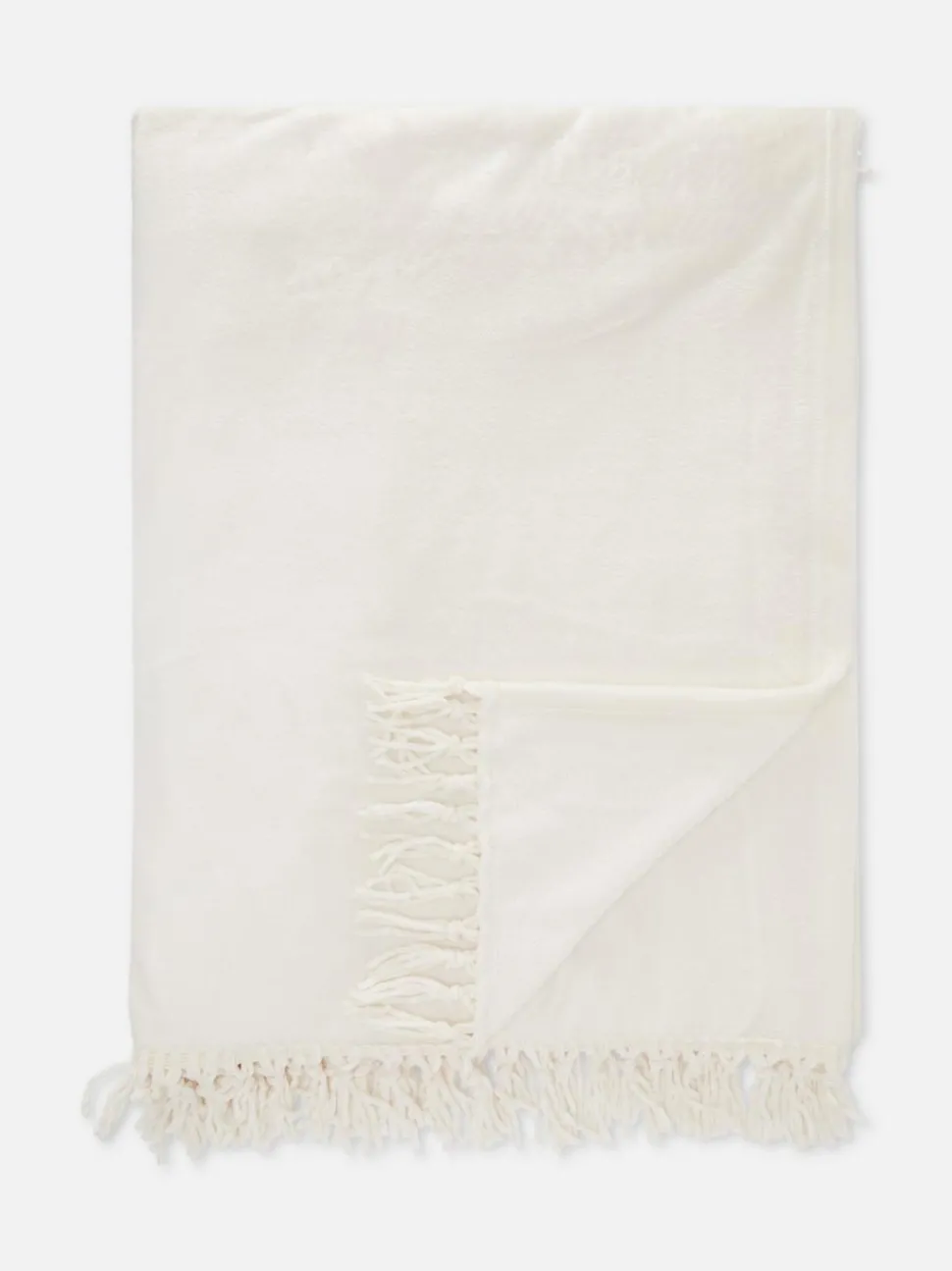 Duża miękka narzuta z frędzlami przy obszyciu