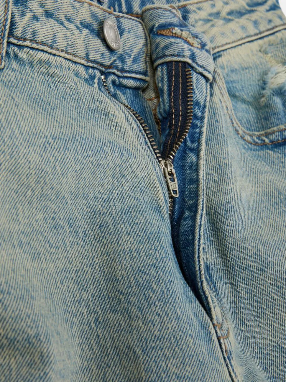 Jeansy typu mom z rozdarciami