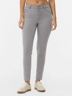 Jeansy ze średnim stanem o kroju skinny | standard