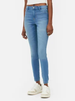 Jeansy ze średnim stanem o kroju skinny | standard