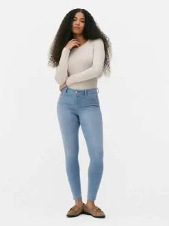 Jeansy ze średnim stanem o kroju skinny | standard