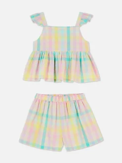 Komplet z bluzką z falbankami i szortami w kratę