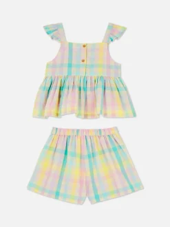 Komplet z bluzką z falbankami i szortami w kratę