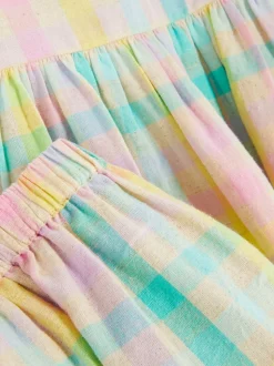 Komplet z bluzką z falbankami i szortami w kratę