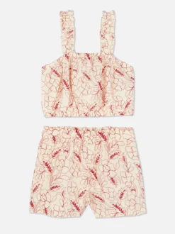 Komplet z topem i szortami z kwiatowym haftem