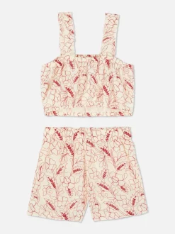 Komplet z topem i szortami z kwiatowym haftem