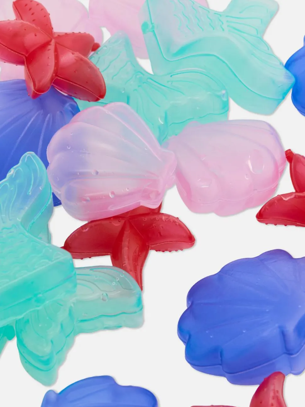 Kostki lodu wielokrotnego użytku w kształcie muszli