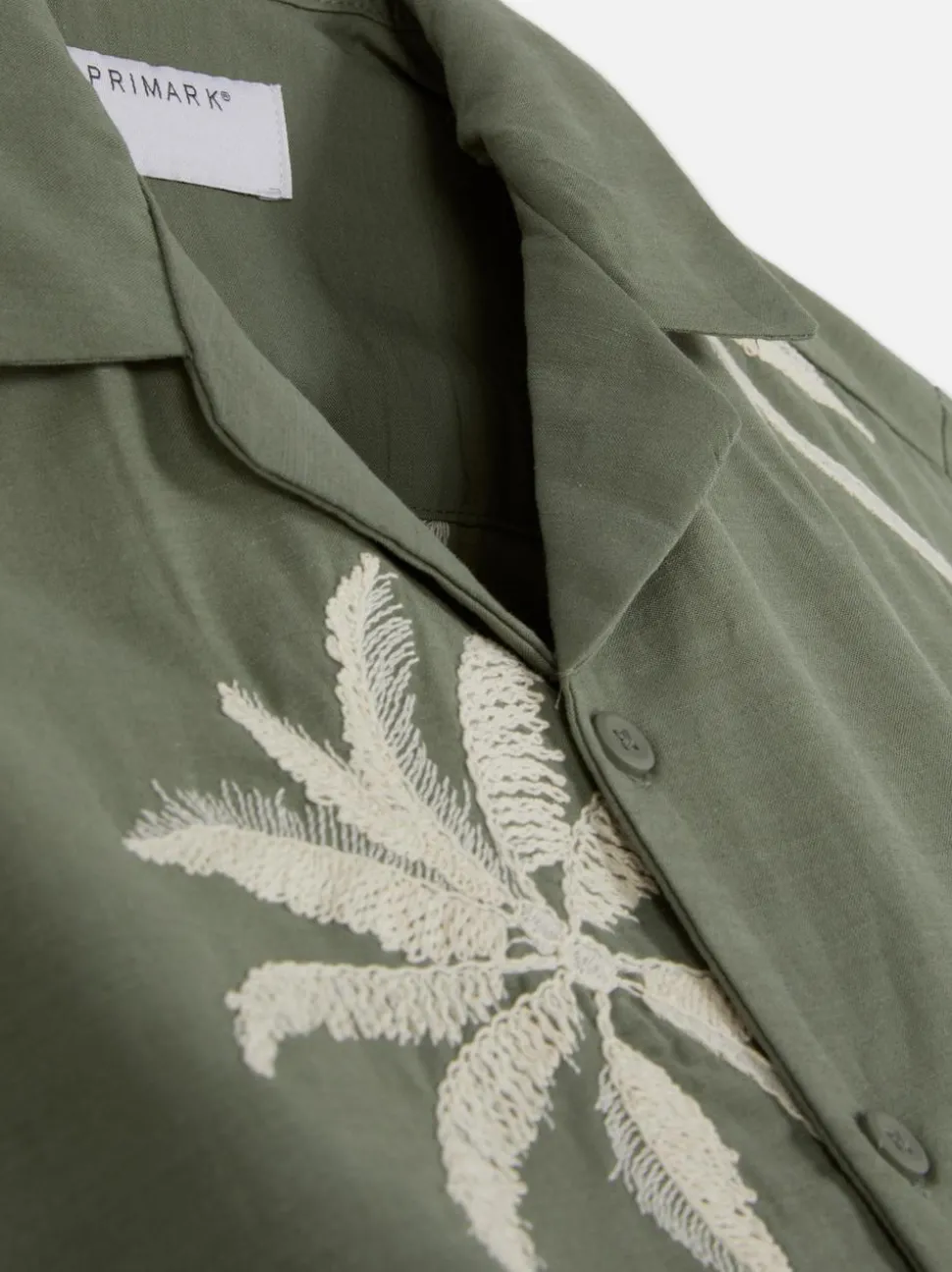 Koszula z haftowaną palmą