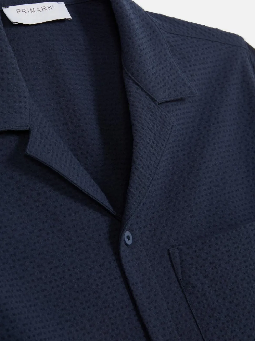 Koszula zapinana na guziki z tkaniny seersucker Kem