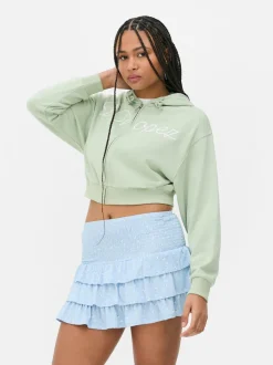 Krótka rozpinana bluza z kapturem i nadrukiem