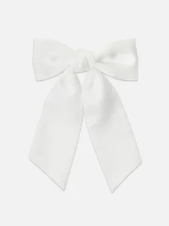 Krótka satynowa kokarda do włosów