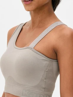 Krótki asymetryczny top Kappa x Primark