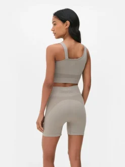 Krótki asymetryczny top Kappa x Primark