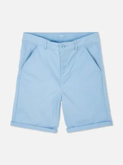 Krótkie chinosy z wywiniętą nogawką