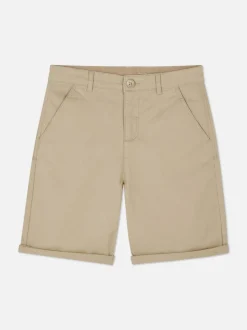 Krótkie chinosy z wywiniętą nogawką