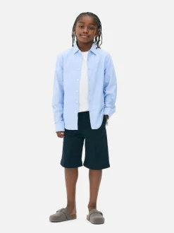 Krótkie chinosy z wywiniętą nogawką