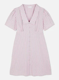 Minisukienka popołudniowa w paski z guzikami