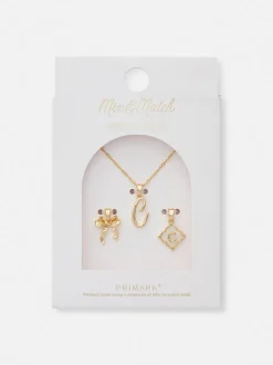 Naszyjnik z inicjałem i różnymi przywieszkami