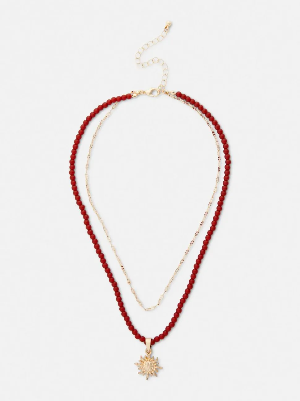 Naszyjnik z koralików z wisiorkiem z motywem słońca