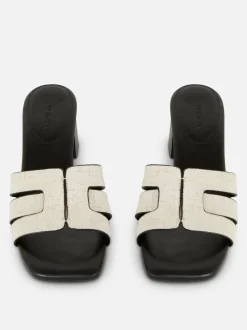 Pantofle bez pięty na słupku z plecionym paskiem