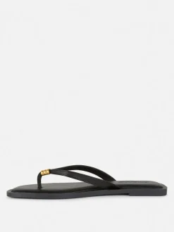 Płaskie sandały-japonki ze zdobieniem przy palcach