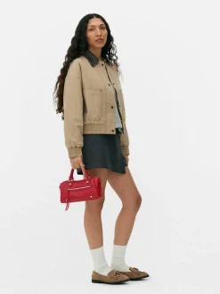 Płócienna kurtka ze sztucznej skóry z kołnierzem