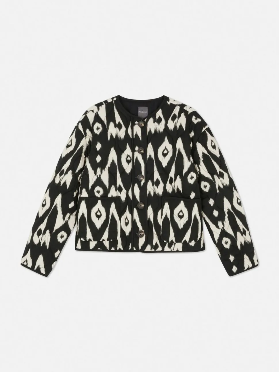 Pikowana kurtka z zapięciem na guziki