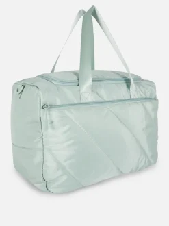 Pikowana torba kabinowa mieszcząca się pod fotelem