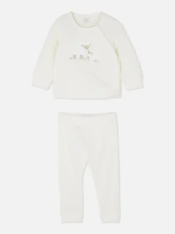 Pikowany komplet z topem i spodniami z aplikacją