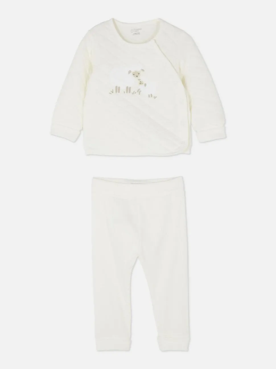 Pikowany komplet z topem i spodniami z aplikacją