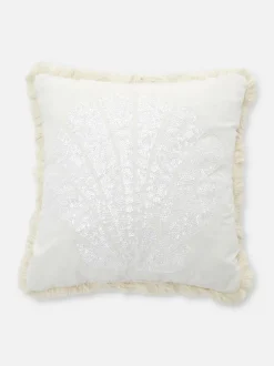 Poduszka z cekinami i motywem muszelki