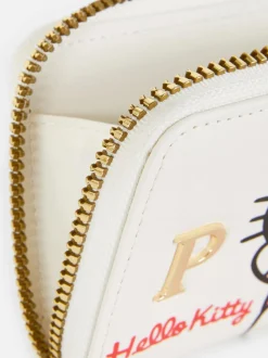 Portmonetka z inicjałem i motywem Hello Kitty