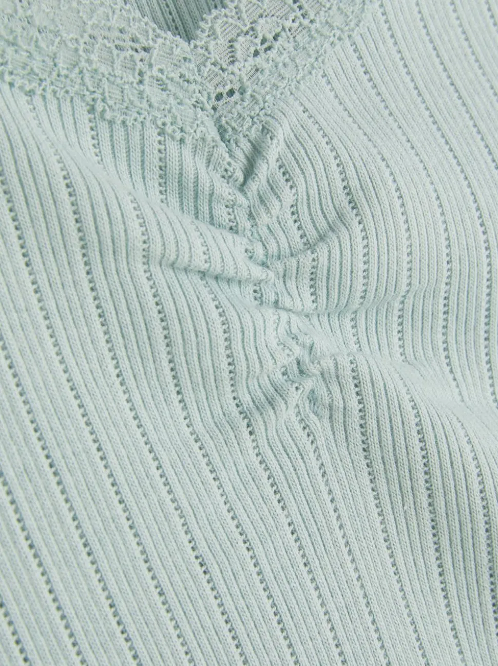 Prążkowana koszulka bez rękawów wykończona koronką