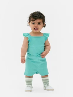 Prążkowany kombinezon z falbanką