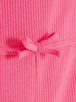 Prążkowany kombinezon z falbanką