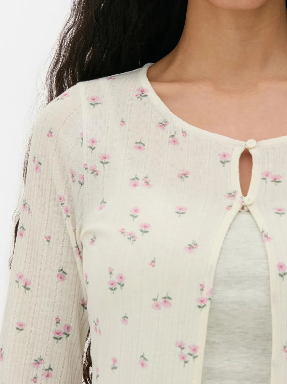 Rozpinany sweter w drobne kwiaty