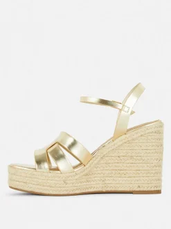 Sandały na koturnie z paskami Paula Echevarría